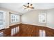 Bright bedroom featuring sleek wood floors and bright natural light at 9364 S Margo Dr, Tempe, AZ 85284