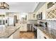 This kitchen offers stainless steel appliances and granite countertops, perfect for culinary enthusiasts at 9364 S Margo Dr, Tempe, AZ 85284