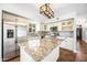 Bright kitchen features stainless steel appliances, granite countertops, and a convenient island at 9364 S Margo Dr, Tempe, AZ 85284