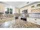 Beautiful kitchen with granite countertops, stainless steel appliances, and ample cabinet space at 9364 S Margo Dr, Tempe, AZ 85284