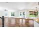 Living space featuring ceramic tile flooring and access to the backyard at 9364 S Margo Dr, Tempe, AZ 85284