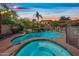 Backyard with a large pool, jacuzzi, and lush landscaping at 9364 S Margo Dr, Tempe, AZ 85284
