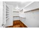 Spacious walk-in closet with custom shelving and rod storage at 9364 S Margo Dr, Tempe, AZ 85284
