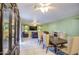 The dining area flows into a cozy living room, ideal for Gathering gatherings and entertaining guests at 12905 W Crocus Dr, El Mirage, AZ 85335