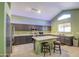 Spacious kitchen with a large island, stainless steel appliances, and plenty of cabinet space at 12905 W Crocus Dr, El Mirage, AZ 85335