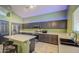 Kitchen features stainless steel appliances and generous counter space, perfect for cooking enthusiasts at 12905 W Crocus Dr, El Mirage, AZ 85335