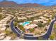 Aerial view of community featuring a pool and desert landscaping in Scottsdale, Arizona at 13300 E Via Linda -- # 1054, Scottsdale, AZ 85259