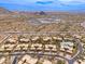 Aerial view of the neighborhood featuring desert landscape and scenic mountain views in Scottsdale, Arizona at 13300 E Via Linda -- # 1054, Scottsdale, AZ 85259
