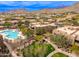 Aerial view of homes, pool, and lush landscaping in Scottsdale, Arizona at 13300 E Via Linda -- # 1054, Scottsdale, AZ 85259