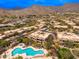 Aerial view of homes, pool and lush landscaping in The Overlook community in Scottsdale, Arizona at 13300 E Via Linda -- # 1054, Scottsdale, AZ 85259