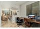 Functional home office space with built-in desks and a view into the main living area at 13300 E Via Linda -- # 1054, Scottsdale, AZ 85259