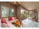 Relaxing outdoor patio with comfortable seating, ceiling fan and scenic views of the desert landscape at 13300 E Via Linda -- # 1054, Scottsdale, AZ 85259
