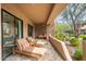 Luxury patio with desert landscaping, sun loungers and a glimpse of additional seating, providing relaxation at 13300 E Via Linda -- # 1054, Scottsdale, AZ 85259