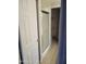 Bathroom featuring a glass enclosed shower, updated hardware, and a large closet at 1449 E Highland Ave # 39, Phoenix, AZ 85014
