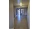 Neutral toned living room featuring tile flooring, an open concept, and bright light at 1449 E Highland Ave # 39, Phoenix, AZ 85014