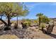 Inviting backyard with cozy seating and stunning desert vistas, creating a tranquil outdoor oasis at 16113 E Andrew Dr, Fountain Hills, AZ 85268
