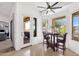 Bright dining area with tile floors, large windows, and comfortable seating at 16113 E Andrew Dr, Fountain Hills, AZ 85268