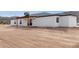 View of the back of the home, highlighting the mountain view and desert landscape at 16567 N Slate Ln, Maricopa, AZ 85139