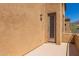 View from a private balcony showing the neutral exterior of the home at 16600 N Thompson Peak Pkwy # 1072, Scottsdale, AZ 85260