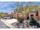 Desert home features a tandem two car garage, balcony, and beautiful desert landscaping at 17025 E La Montana Dr # 123, Fountain Hills, AZ 85268