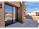 Exterior view of a patio area with sliding glass doors at 17025 E La Montana Dr # 123, Fountain Hills, AZ 85268