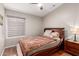 Comfortable bedroom with ceiling fan, light walls, and neutral decor at 1741 S Clearview Ave # 70, Mesa, AZ 85209