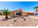 Charming single-story home with a well-maintained desert landscaped front yard, tile roof, and three-car garage at 1741 S Clearview Ave # 70, Mesa, AZ 85209