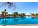 Scenic waterfront view with serene blue waters and lush landscaping, perfect for peaceful living at 1741 S Clearview Ave # 70, Mesa, AZ 85209