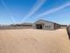 A spacious backyard with new construction, perfect for outdoor entertaining and recreation at 17621 W Pierson St, Goodyear, AZ 85395