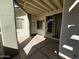 Private outdoor patio featuring a shaded area with sliding glass door entrance at 1825 W Ray Rd # 1058, Chandler, AZ 85224