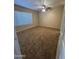 Bedroom with large window, ceiling fan, and neutral decor at 1825 W Ray Rd # 1058, Chandler, AZ 85224