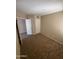 Neutral bedroom with carpet and closet access, ready for personalization at 1825 W Ray Rd # 1058, Chandler, AZ 85224