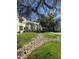 Well-maintained community with lush landscaping, walkways, and attractive building exteriors at 1825 W Ray Rd # 1058, Chandler, AZ 85224