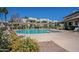 Community pool with lounge chairs and pristine landscaping in a well-maintained neighborhood at 1825 W Ray Rd # 1058, Chandler, AZ 85224