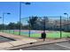Community tennis courts with lighting for evening play at 1825 W Ray Rd # 1058, Chandler, AZ 85224