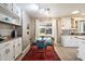 Eat-in kitchen has granite counters, modern stainless appliances, and great natural light at 1939 E Solano Dr, Phoenix, AZ 85016