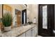 Elegant bathroom with granite countertops, modern fixtures, and natural light, offering a luxurious and serene experience at 2174 E Avenida Del Valle Ct, Gilbert, AZ 85298