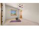 Bright, airy room with an exercise mat, dumbbells and a large window, ideal for fitness and a healthy lifestyle at 2174 E Avenida Del Valle Ct, Gilbert, AZ 85298