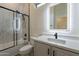 Bathroom with a shower, modern vanity, and sink at 21913 N Pedregosa Ct, Sun City West, AZ 85375