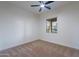 Bedroom with carpet flooring and window at 21913 N Pedregosa Ct, Sun City West, AZ 85375