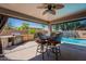 Entertain outdoors with a built in BBQ island and a refreshing private swimming pool at 23306 S 221St St, Queen Creek, AZ 85142