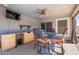 Covered patio includes ceiling fan, a grill, and built-in counter with sink at 23306 S 221St St, Queen Creek, AZ 85142