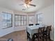 Bright dining area featuring a large window and a traditional dining set, perfect for Gathering meals at 23306 S 221St St, Queen Creek, AZ 85142
