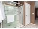 Walk-in shower with glass door in ensuite bathroom at 2580 E Boston St, Gilbert, AZ 85295