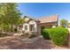 Charming single-story home with well-maintained landscaping and a welcoming entryway at 2580 E Boston St, Gilbert, AZ 85295