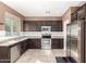 Well-equipped kitchen with stainless steel appliances and generous counter space at 2580 E Boston St, Gilbert, AZ 85295