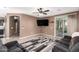 Spacious living area with views into the kitchen and outdoor living space at 2580 E Boston St, Gilbert, AZ 85295