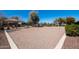 Community sand volleyball court surrounded by trees and grass at 2580 E Boston St, Gilbert, AZ 85295