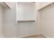 Spacious closet features custom shelving, maximizing storage in this well-organized space at 26015 N 85Th Dr, Peoria, AZ 85383