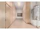 Spacious garage with built-in cabinets and a water heater inside a closed compartment at 26015 N 85Th Dr, Peoria, AZ 85383
